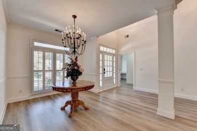 Discover a meticulously designed home that seamlessly blends on Canongate At Olde Atlanta Golf Club in Georgia - for sale on GolfHomes.com, golf home, golf lot