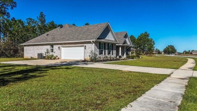 Discover a home that combines modern luxury, ample space, and an on Windswept Dunes Golf Club in Florida - for sale on GolfHomes.com, golf home, golf lot