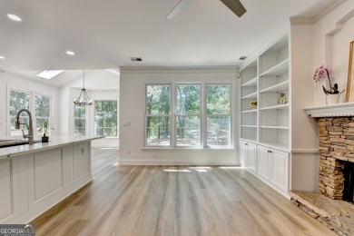 Discover a meticulously designed home that seamlessly blends on Canongate At Olde Atlanta Golf Club in Georgia - for sale on GolfHomes.com, golf home, golf lot