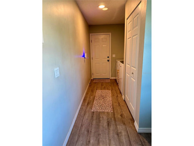 Check out this beautifully maintained home nestled in the on The Grand Club - Pine Lakes Course in Florida - for sale on GolfHomes.com, golf home, golf lot