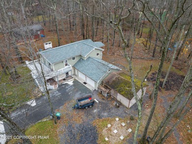 Beautifully maintained 2-story home in a private, amenity-rich on Pocono Farms Country Club in Pennsylvania - for sale on GolfHomes.com, golf home, golf lot