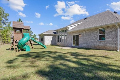 Discover a home that combines modern luxury, ample space, and an on Windswept Dunes Golf Club in Florida - for sale on GolfHomes.com, golf home, golf lot