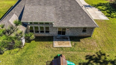 Discover a home that combines modern luxury, ample space, and an on Windswept Dunes Golf Club in Florida - for sale on GolfHomes.com, golf home, golf lot