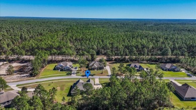 Discover a home that combines modern luxury, ample space, and an on Windswept Dunes Golf Club in Florida - for sale on GolfHomes.com, golf home, golf lot