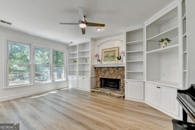 Discover a meticulously designed home that seamlessly blends on Canongate At Olde Atlanta Golf Club in Georgia - for sale on GolfHomes.com, golf home, golf lot