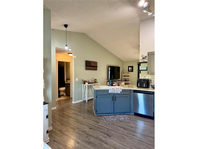 Check out this beautifully maintained home nestled in the on The Grand Club - Pine Lakes Course in Florida - for sale on GolfHomes.com, golf home, golf lot