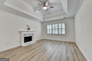 Discover a meticulously designed home that seamlessly blends on Canongate At Olde Atlanta Golf Club in Georgia - for sale on GolfHomes.com, golf home, golf lot