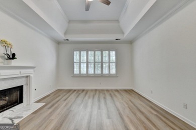 Discover a meticulously designed home that seamlessly blends on Canongate At Olde Atlanta Golf Club in Georgia - for sale on GolfHomes.com, golf home, golf lot
