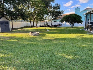 Check out this beautifully maintained home nestled in the on The Grand Club - Pine Lakes Course in Florida - for sale on GolfHomes.com, golf home, golf lot