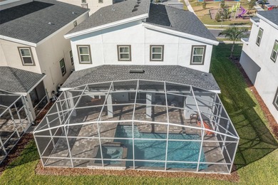 Beautifully furnished and very well maintained 7-bedroom on ChampionsGate Golf Resort in Florida - for sale on GolfHomes.com, golf home, golf lot