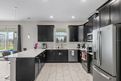 Beautifully furnished and very well maintained 7-bedroom on ChampionsGate Golf Resort in Florida - for sale on GolfHomes.com, golf home, golf lot