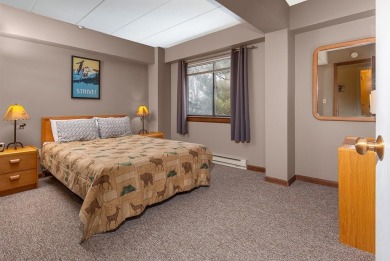 This spacious, corner unit has beautiful views of the abutting on Killington Golf Course in Vermont - for sale on GolfHomes.com, golf home, golf lot