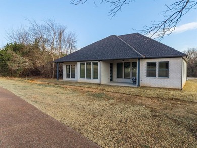 Exquisite home has four bedrooms, two and half bathrooms.  1,953 on White Bluff Resort - New Course in Texas - for sale on GolfHomes.com, golf home, golf lot