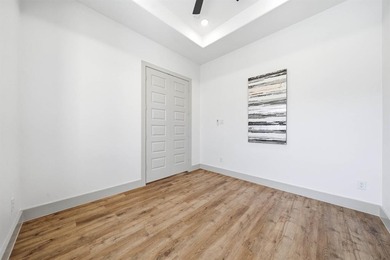 Exquisite home has four bedrooms, two and half bathrooms.  1,953 on White Bluff Resort - New Course in Texas - for sale on GolfHomes.com, golf home, golf lot