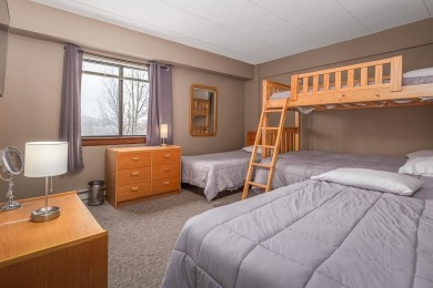 This spacious, corner unit has beautiful views of the abutting on Killington Golf Course in Vermont - for sale on GolfHomes.com, golf home, golf lot