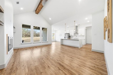 Exquisite home has four bedrooms, two and half bathrooms.  1,953 on White Bluff Resort - New Course in Texas - for sale on GolfHomes.com, golf home, golf lot