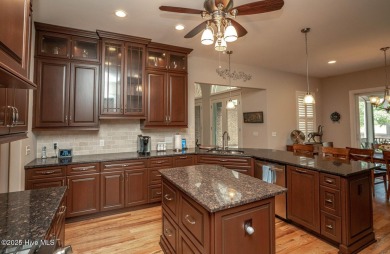 Welcome to your dream home! Nestled in the picturesque community on Ocean Ridge Plantation in North Carolina - for sale on GolfHomes.com, golf home, golf lot