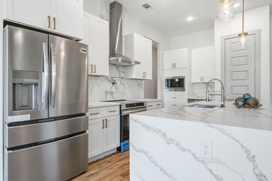 Exquisite home has four bedrooms, two and half bathrooms.  1,953 on White Bluff Resort - New Course in Texas - for sale on GolfHomes.com, golf home, golf lot