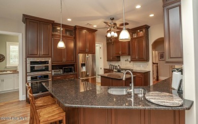 Welcome to your dream home! Nestled in the picturesque community on Ocean Ridge Plantation in North Carolina - for sale on GolfHomes.com, golf home, golf lot
