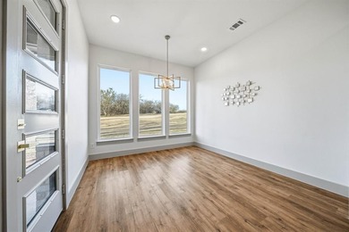 Exquisite home has four bedrooms, two and half bathrooms.  1,953 on White Bluff Resort - New Course in Texas - for sale on GolfHomes.com, golf home, golf lot