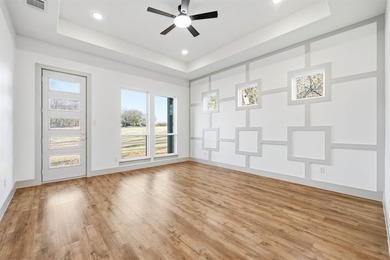 Exquisite home has four bedrooms, two and half bathrooms.  1,953 on White Bluff Resort - New Course in Texas - for sale on GolfHomes.com, golf home, golf lot