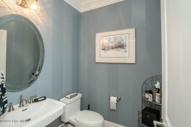 Welcome to your dream home! Nestled in the picturesque community on Ocean Ridge Plantation in North Carolina - for sale on GolfHomes.com, golf home, golf lot
