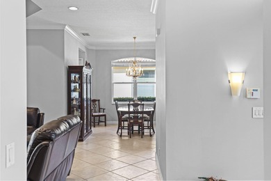 Beautiful 3-bedroom, 3-bath pool home in the highly desired PGA on The Legacy Golf and Tennis Club in Florida - for sale on GolfHomes.com, golf home, golf lot