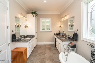 Welcome to your dream home! Nestled in the picturesque community on Ocean Ridge Plantation in North Carolina - for sale on GolfHomes.com, golf home, golf lot