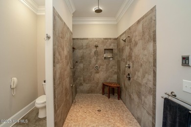 Welcome to your dream home! Nestled in the picturesque community on Ocean Ridge Plantation in North Carolina - for sale on GolfHomes.com, golf home, golf lot