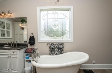 Welcome to your dream home! Nestled in the picturesque community on Ocean Ridge Plantation in North Carolina - for sale on GolfHomes.com, golf home, golf lot