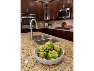 **Assumable 3.5%, 30 yr mortgage!!!** Well maintained Ranch with on Pelican Lakes Golf and Country Club in Colorado - for sale on GolfHomes.com, golf home, golf lot