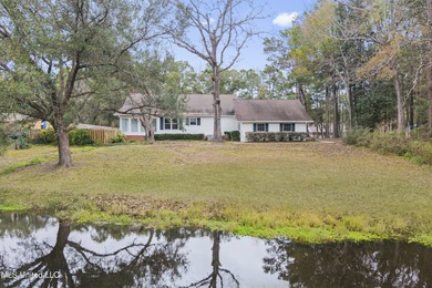 Beautiful Southern style home nestled on a serene 1 1/2 acre on Mississippi National Golf Course in Mississippi - for sale on GolfHomes.com, golf home, golf lot