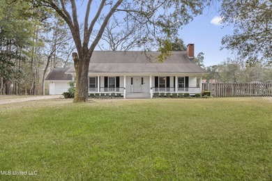 Beautiful Southern style home nestled on a serene 1 1/2 acre on Mississippi National Golf Course in Mississippi - for sale on GolfHomes.com, golf home, golf lot
