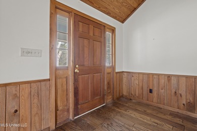 Beautiful Southern style home nestled on a serene 1 1/2 acre on Mississippi National Golf Course in Mississippi - for sale on GolfHomes.com, golf home, golf lot