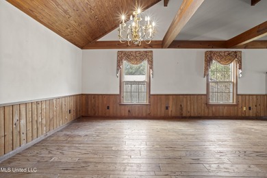 Beautiful Southern style home nestled on a serene 1 1/2 acre on Mississippi National Golf Course in Mississippi - for sale on GolfHomes.com, golf home, golf lot