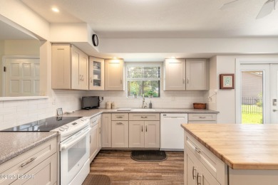 Discover this beautifully maintained 3-bed, 2-bath canal front on The Club At Pelican Bay - North Course in Florida - for sale on GolfHomes.com, golf home, golf lot