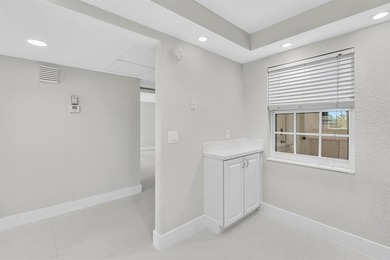 FULLY renovated second-floor 3-bedroom, 2-bath home combining on Palm-Aire Country Club and Resort - The Oaks in Florida - for sale on GolfHomes.com, golf home, golf lot