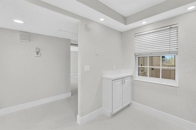 FULLY renovated second-floor 3-bedroom, 2-bath home combining on Palm-Aire Country Club and Resort - The Oaks in Florida - for sale on GolfHomes.com, golf home, golf lot