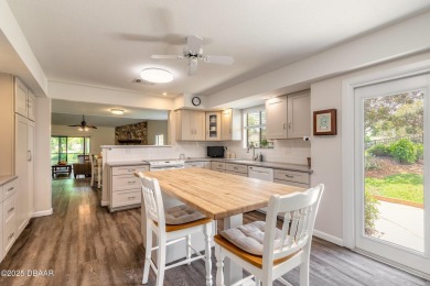 Discover this beautifully maintained 3-bed, 2-bath canal front on The Club At Pelican Bay - North Course in Florida - for sale on GolfHomes.com, golf home, golf lot