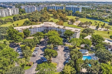 FULLY renovated second-floor 3-bedroom, 2-bath home combining on Palm-Aire Country Club and Resort - The Oaks in Florida - for sale on GolfHomes.com, golf home, golf lot