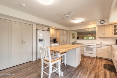 Discover this beautifully maintained 3-bed, 2-bath canal front on The Club At Pelican Bay - North Course in Florida - for sale on GolfHomes.com, golf home, golf lot