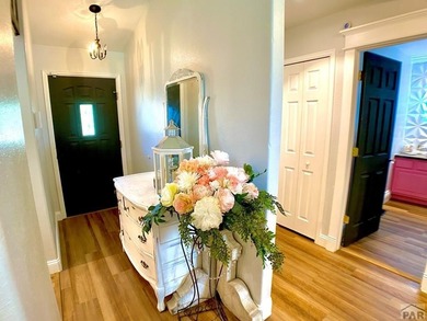 Welcome to this beautifully maintained 4-bedroom, 3-bathroom on Desert Hawk At Pueblo West in Colorado - for sale on GolfHomes.com, golf home, golf lot