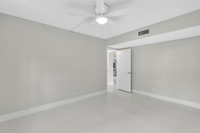 FULLY renovated second-floor 3-bedroom, 2-bath home combining on Palm-Aire Country Club and Resort - The Oaks in Florida - for sale on GolfHomes.com, golf home, golf lot