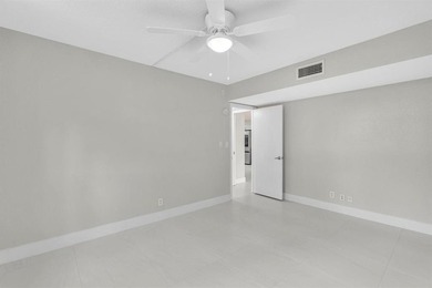 FULLY renovated second-floor 3-bedroom, 2-bath home combining on Palm-Aire Country Club and Resort - The Oaks in Florida - for sale on GolfHomes.com, golf home, golf lot