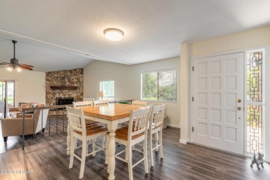 Discover this beautifully maintained 3-bed, 2-bath canal front on The Club At Pelican Bay - North Course in Florida - for sale on GolfHomes.com, golf home, golf lot