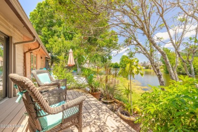 Discover this beautifully maintained 3-bed, 2-bath canal front on The Club At Pelican Bay - North Course in Florida - for sale on GolfHomes.com, golf home, golf lot