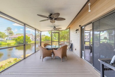 Discover this beautifully maintained 3-bed, 2-bath canal front on The Club At Pelican Bay - North Course in Florida - for sale on GolfHomes.com, golf home, golf lot
