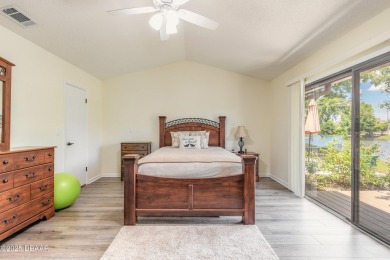 Discover this beautifully maintained 3-bed, 2-bath canal front on The Club At Pelican Bay - North Course in Florida - for sale on GolfHomes.com, golf home, golf lot