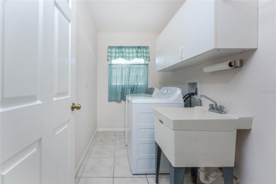 What a great price for this three bedroom/2 bath/2 car garage on Rotonda Golf and Country Club The Palms Course in Florida - for sale on GolfHomes.com, golf home, golf lot