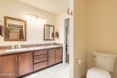 Discover this beautifully maintained 3-bed, 2-bath canal front on The Club At Pelican Bay - North Course in Florida - for sale on GolfHomes.com, golf home, golf lot